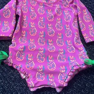 RuffleButts Pineapple Rash Guard Swimsuit | Baby Girl 6–12M